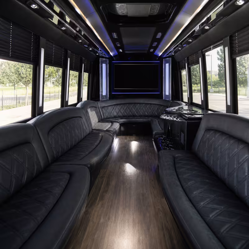 Friends laughing during a Oxnard party bus celebration