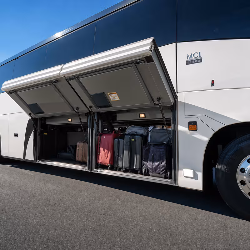 Party bus interior with wraparound leather seating and LED lighting in Oxnard
