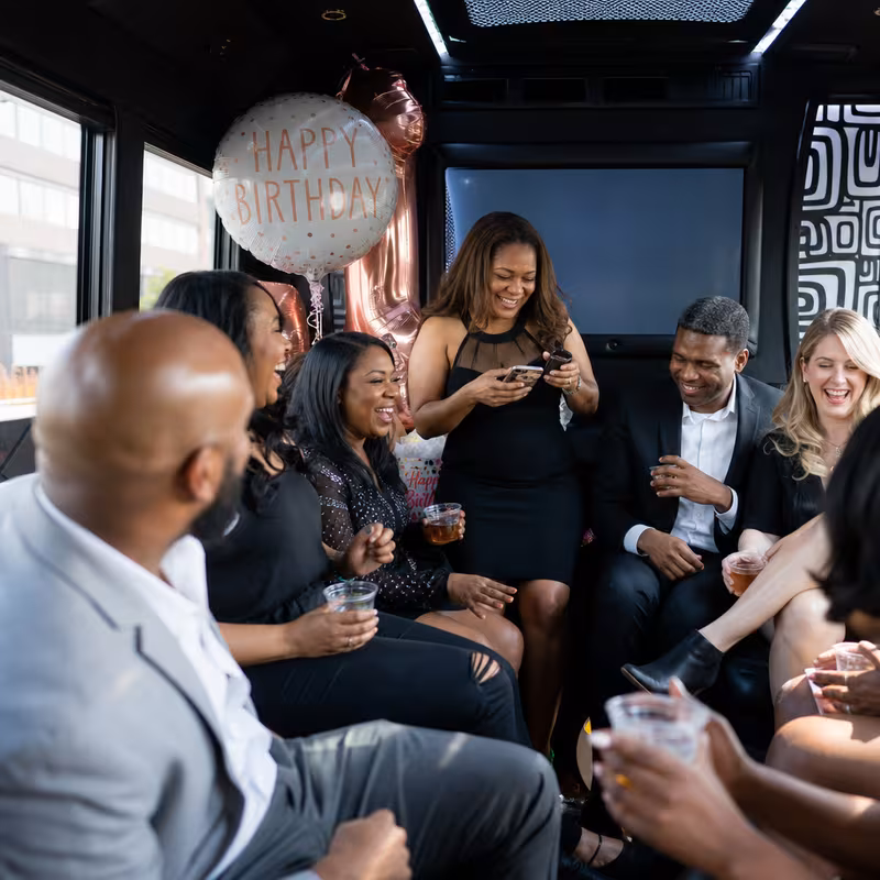 Black Mercedes Sprinter van staged for an Oxnard Birthday Transportation group
