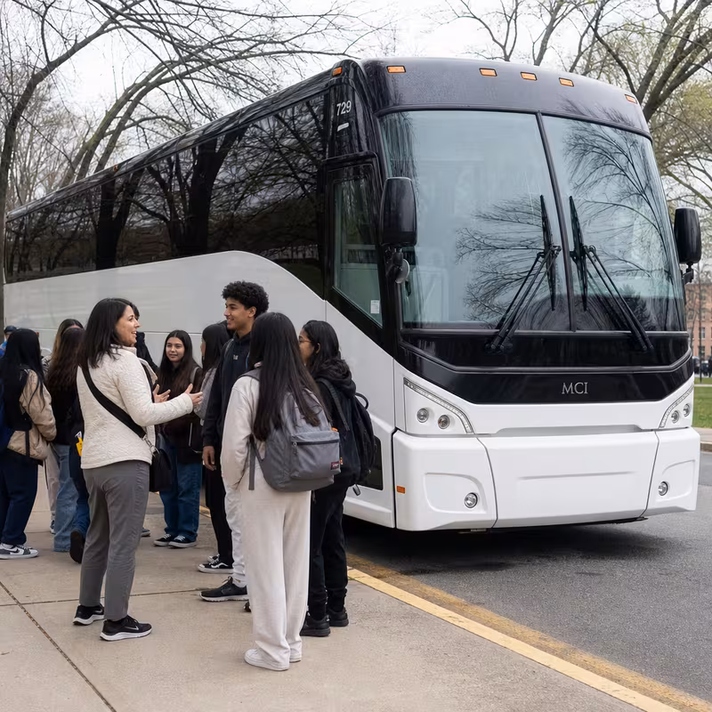 Black Mercedes Sprinter van staged for an Oxnard School Transportation group
