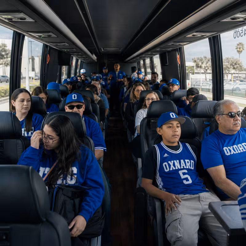 Black Mercedes Sprinter van staged for an Oxnard Sporting Event Transportation group